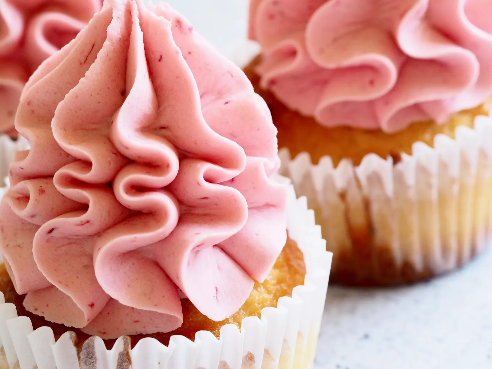 Pink cupcakes in a row