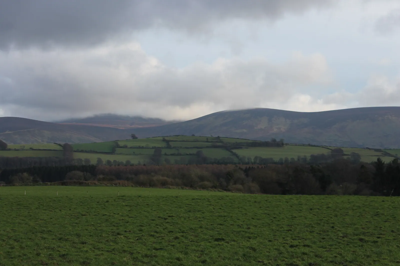 Hills in mist above a valley