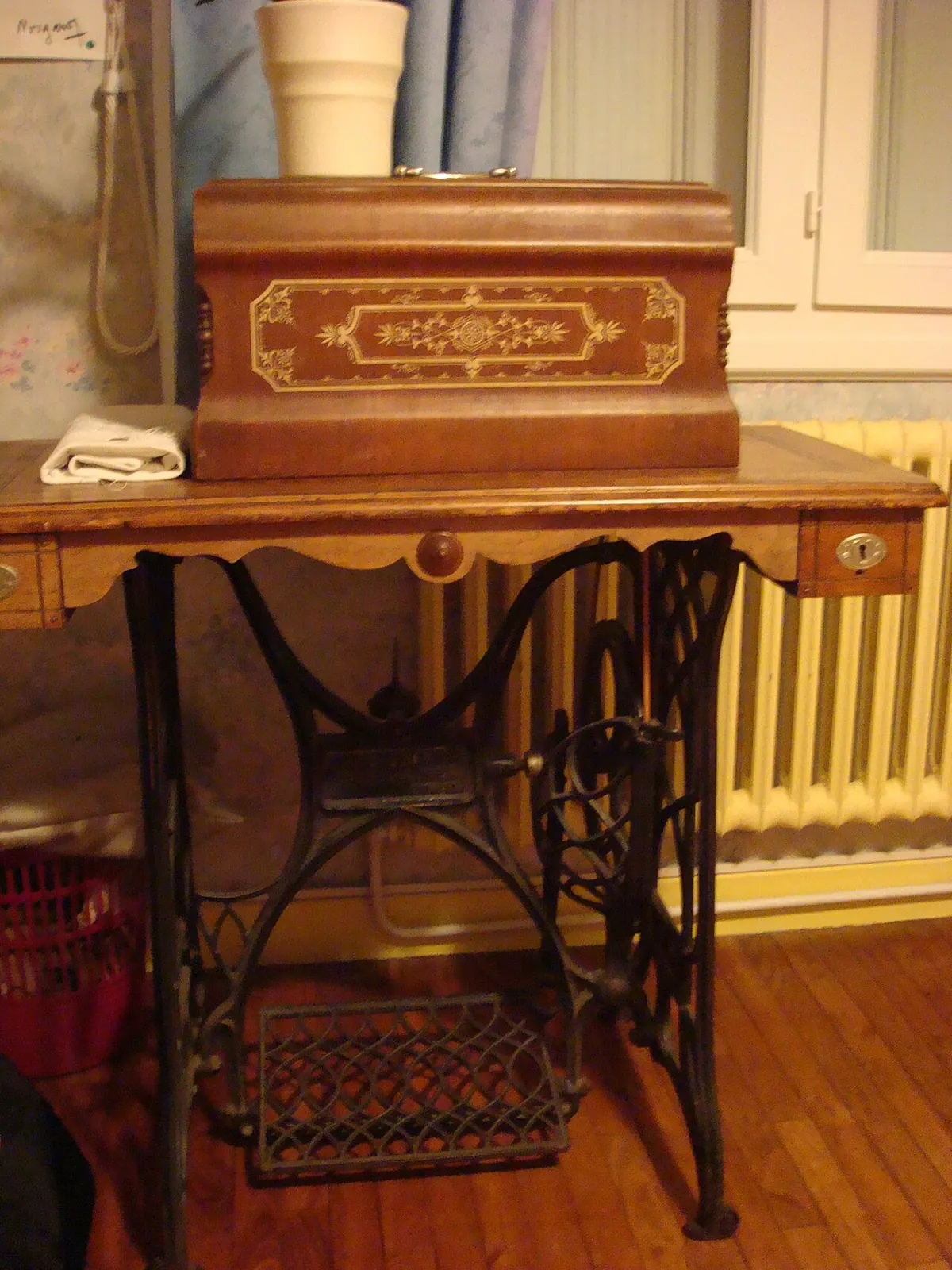 An old sewing machine on a table